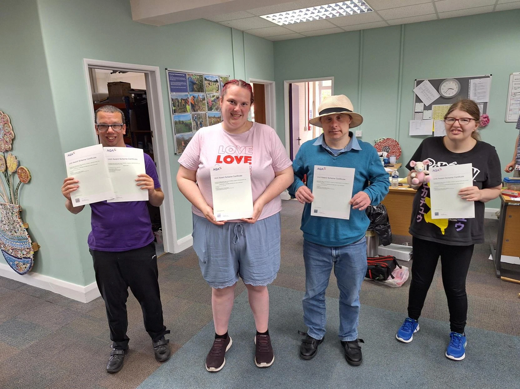 Learners receiving their AQA awards